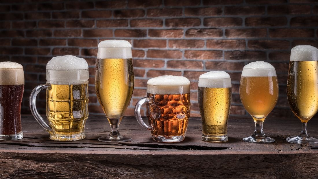 pints of vegan beer lined up on a bar