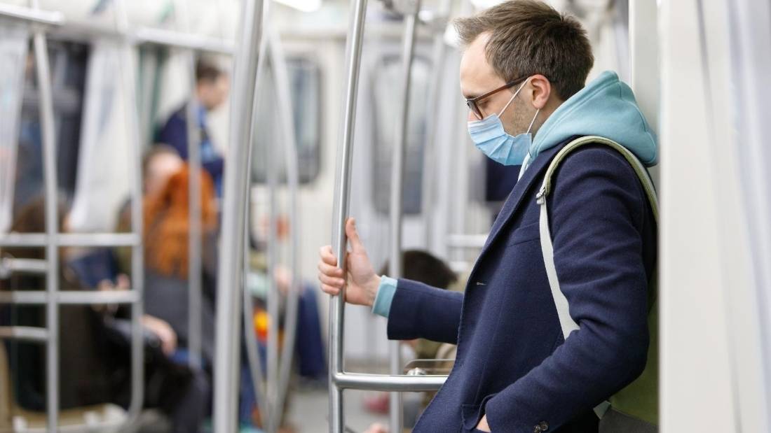public health man on train in mask