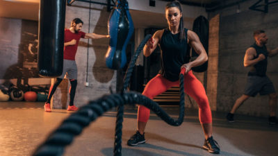 woman with battle ropes