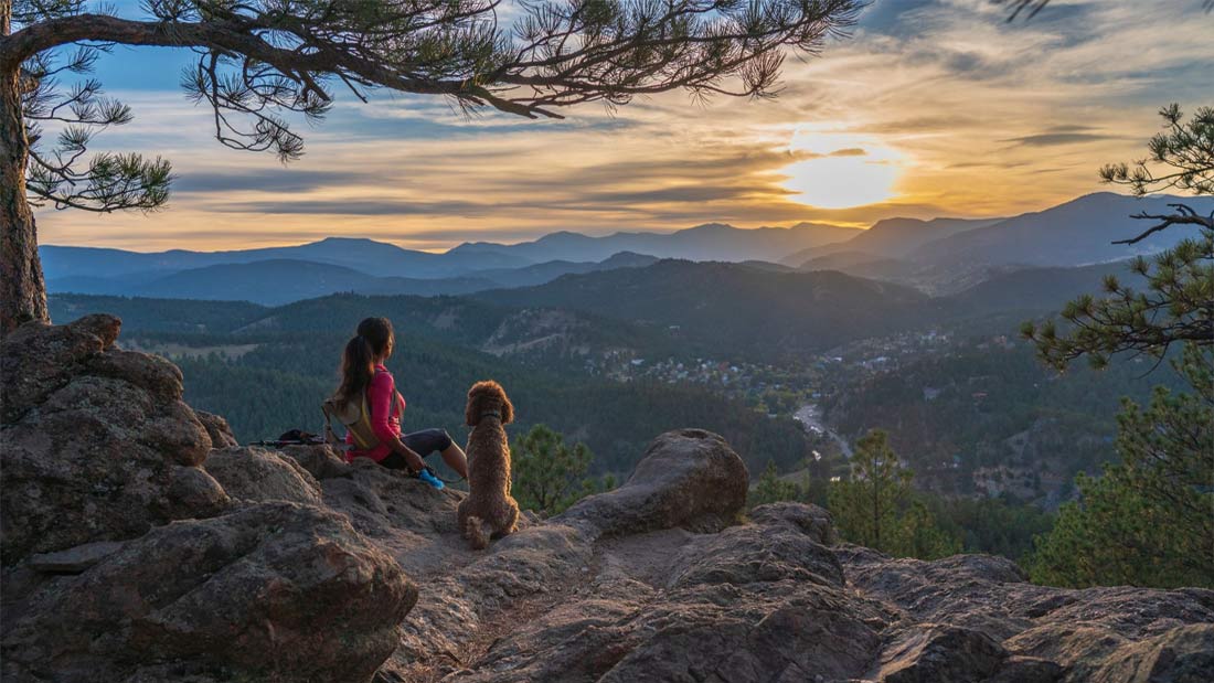 hiker with her dog