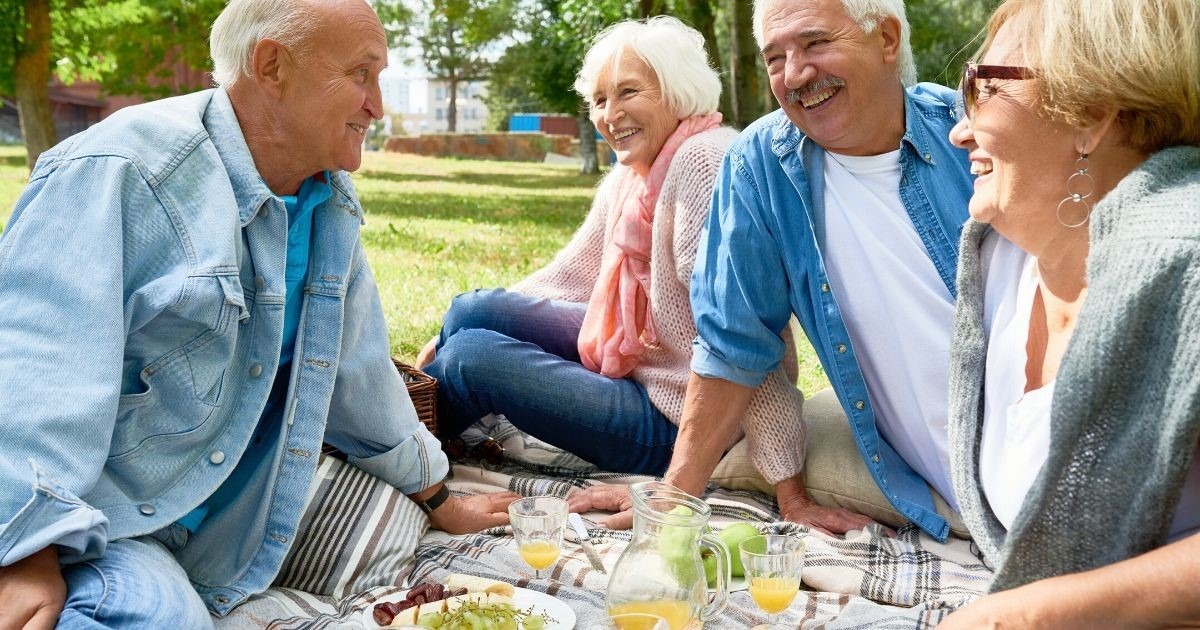 Older people enjoying a picnic