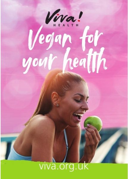 woman smiling eating an apple on front of vegan for your health poster