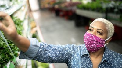 Buying veg in a face mask