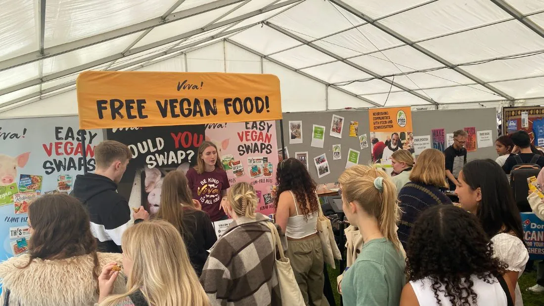 Students engage and queue for free food at Viva!'s Bristol freshers event