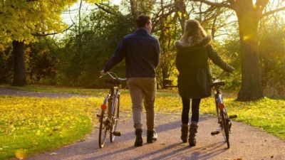 Two people with their bikes