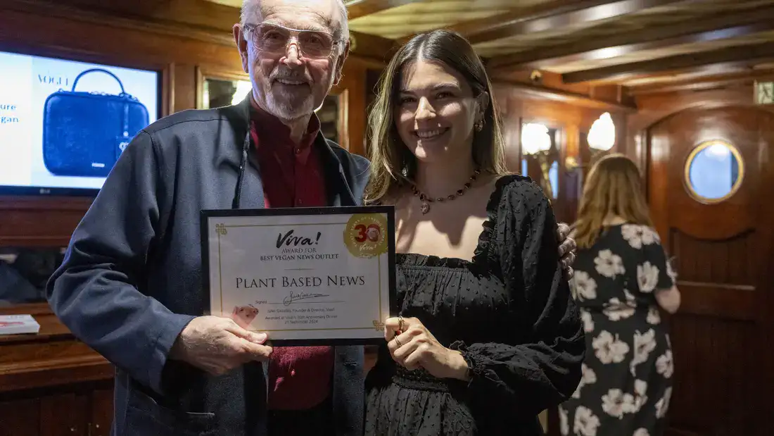 Polly Foreman accepts the award for Plant Based News. With Peter Egan.