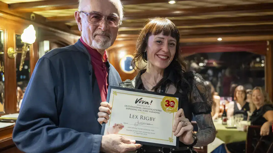 Lex Rigby accepting award. With Peter Egan.