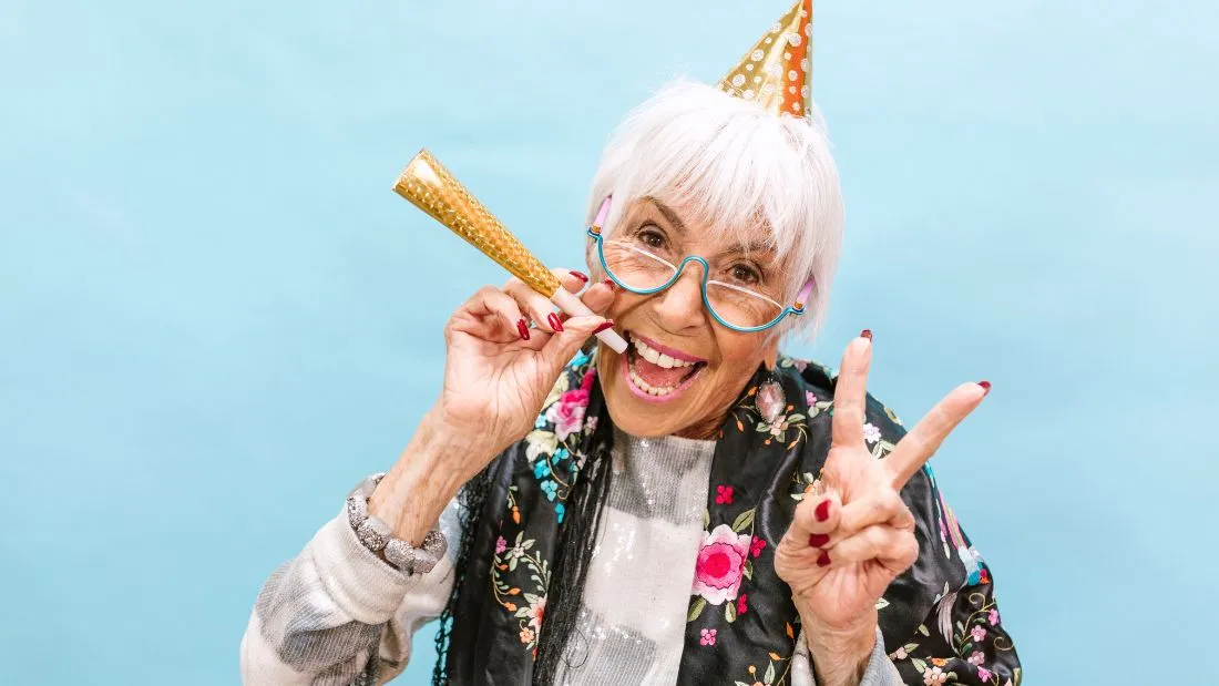 Older woman celebrating