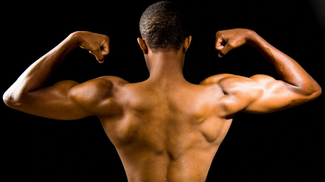 man showing off muscular back