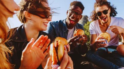 enjoying burgers